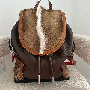 Christian Louboutin fur backpack